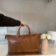 Borsone da viaggio  in 100% pelle sintetica, classico ed elegante tasche e zip For Sale